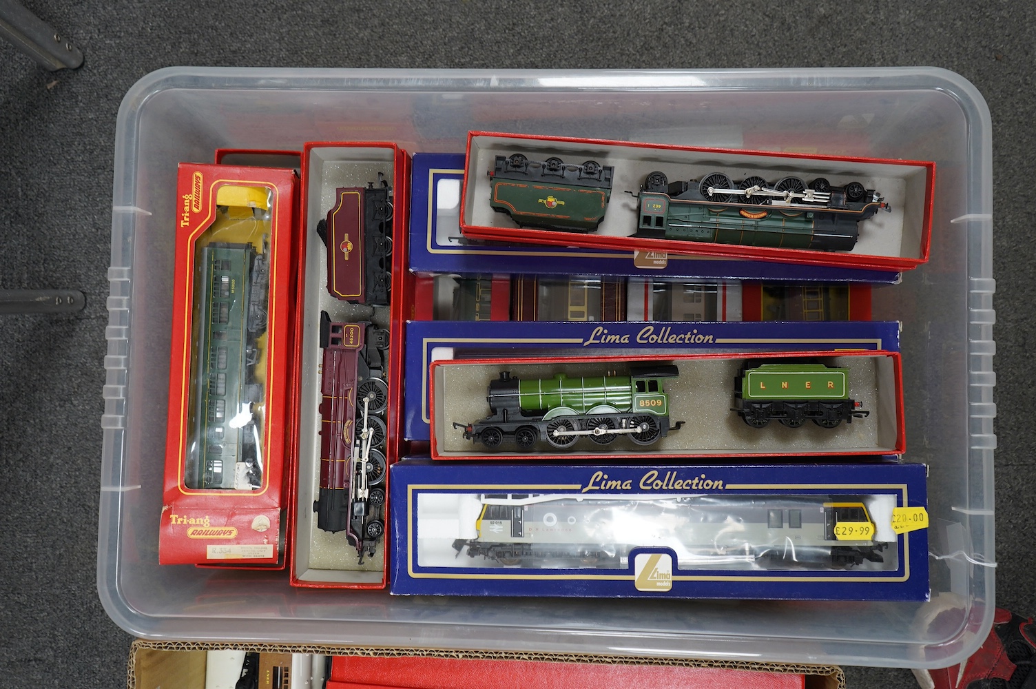 A collection of 00 gauge railway by Hornby, Tri-ang, Lima, etc. including seven locomotives and twenty-six bogie coaches including; LNER, Pullman, Royal Mail, BR, etc. Condition fair to good, some items boxed.